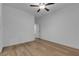 Open bedroom featuring hardwood floors and a ceiling fan for added comfort at 9570 Thistle Creek Ave, Las Vegas, NV 89178