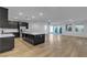 Spacious open floorplan featuring the kitchen with a large island, and lots of natural light at 9570 Thistle Creek Ave, Las Vegas, NV 89178