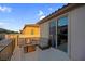 Rooftop deck featuring a seating area with fire pit and scenic views at 9654 Starfish Reef Way, Las Vegas, NV 89178