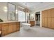 Elegant bathroom featuring a soaking tub, dual vanities, and custom lighting at 10277 Roma Madre Ave, Las Vegas, NV 89135