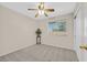 Neutral-toned bedroom with carpet, window, and closet at 11022 Saint Rafael St, Las Vegas, NV 89141