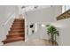 Inviting entryway with staircase and decorative plant at 11022 Saint Rafael St, Las Vegas, NV 89141