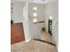 Inviting entryway featuring tile flooring and staircase leading to the upper level at 11022 Saint Rafael St, Las Vegas, NV 89141