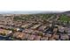 An aerial view of a lovely neighborhood in a desirable community with well-manicured streets and landscaping at 11731 Longworth Rd, Las Vegas, NV 89135