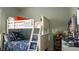 This bedroom has a bunk bed with plenty of toys and storage for a growing Gathering at 11731 Longworth Rd, Las Vegas, NV 89135