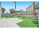 A backyard features a lush lawn with brick wall at 1501 Lucia Dr, Las Vegas, NV 89128