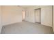 Comfortable bedroom features carpet flooring and closet space at 1501 Lucia Dr, Las Vegas, NV 89128