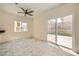 Bright dining space with sliding glass doors leading to the patio, perfect for entertaining at 1501 Lucia Dr, Las Vegas, NV 89128