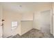 Upstairs hallway featuring a carpeted floor, and white doors at 1501 Lucia Dr, Las Vegas, NV 89128