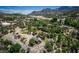 Gorgeous land parcel showcasing a home surrounded by dense trees, picturesque views, and a tranquil ambiance at 18480 State Hwy 160, Las Vegas, NV 89161