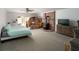 Spacious basement with wood-burning stove, carpeted floors, and ample storage with sliding glass doors at 18480 State Hwy 160, Las Vegas, NV 89161