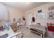 Stylishly decorated bedroom featuring pink accents, vanity table, and a comfortable bed at 18480 State Hwy 160, Las Vegas, NV 89161