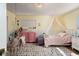 A bedroom painted with dual tones and a swing in the corner at 18480 State Hwy 160, Las Vegas, NV 89161