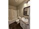 Bathroom featuring granite vanity countertop, shower and tub combo at 1870 Upland Ave, Pahrump, NV 89048