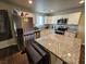 Beautiful kitchen with stainless steel appliances, white cabinets and granite countertops at 1870 Upland Ave, Pahrump, NV 89048