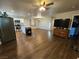 Open living space featuring lots of natural light and wood-look flooring at 1870 Upland Ave, Pahrump, NV 89048