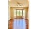 Bright bedroom with hardwood floors, a large bay window, and recessed lighting at 1941 Williamsport St, Henderson, NV 89052