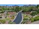 A landscaped entry with lush greenery, waterfalls, and signage, creating a welcoming first impression at 1941 Williamsport St, Henderson, NV 89052