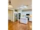 Bright, updated kitchen with stainless steel appliances, white cabinetry, and a center island at 1941 Williamsport St, Henderson, NV 89052