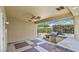 Covered patio features tiled floors, recessed lighting, ceiling fan and a built-in outdoor grill at 1941 Williamsport St, Henderson, NV 89052