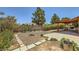 Scenic backyard with landscaping, covered patio and mountain views from this outdoor living space at 1950 Abarth St, Las Vegas, NV 89142