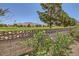 Expansive backyard view overlooking the golf course and mountain range for tranquil outdoor enjoyment at 1950 Abarth St, Las Vegas, NV 89142