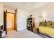 Comfortable bedroom featuring closet, decor, and carpet flooring at 1950 Abarth St, Las Vegas, NV 89142