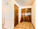 Inviting home foyer with tile flooring and wood doors at 1950 Abarth St, Las Vegas, NV 89142