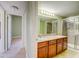 Bathroom featuring double vanity, granite countertops, and glass-enclosed shower at 2212 Sunfish Dr # C, Henderson, NV 89014