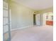 Spacious bedroom showcasing an arched doorway leading to the en-suite bathroom at 2212 Sunfish Dr # C, Henderson, NV 89014