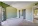 This spacious bedroom features a mirrored closet, fresh paint and French doors to the balcony at 2212 Sunfish Dr # C, Henderson, NV 89014