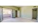Bright bedroom with closet and patio access for indoor/outdoor living at 2212 Sunfish Dr # C, Henderson, NV 89014