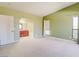 Bedroom showcasing an arched doorway leading to the en-suite bathroom at 2212 Sunfish Dr # C, Henderson, NV 89014