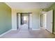 The bedroom features mirrored closet doors, an air vent, and fresh paint at 2212 Sunfish Dr # C, Henderson, NV 89014