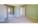 This bedroom features mirrored closet doors, and fresh paint with easy access to en-suite bathroom at 2212 Sunfish Dr # C, Henderson, NV 89014
