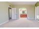 Bedroom showcasing an arched doorway leading to the en-suite bathroom at 2212 Sunfish Dr # C, Henderson, NV 89014