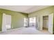 Spacious bedroom with neutral carpet and private balcony access at 2212 Sunfish Dr # C, Henderson, NV 89014