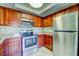 Modern kitchen featuring stainless steel appliances and ample cabinet space at 2212 Sunfish Dr # C, Henderson, NV 89014
