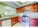 Efficient kitchen with stainless steel appliances and countertop seating at 2212 Sunfish Dr # C, Henderson, NV 89014