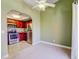 View of kitchen with stainless steel appliances adjacent to empty living room space at 2212 Sunfish Dr # C, Henderson, NV 89014