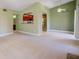 Open living room area with a view of the kitchen and bathroom at 2212 Sunfish Dr # C, Henderson, NV 89014