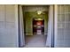 The living room and kitchen are visible through the French doors and shutters at 2212 Sunfish Dr # C, Henderson, NV 89014