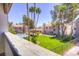 Community pool and manicured lawns seen from private balcony at 2212 Sunfish Dr # C, Henderson, NV 89014