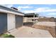 Backyard features concrete patios and a covered carport structure at 2301 Maverick St, Las Vegas, NV 89108