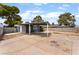 Backyard showcasing the carport and potential for landscaping and gardening at 2301 Maverick St, Las Vegas, NV 89108