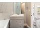 Bathroom with a vanity and tub-shower combo, with modern fixtures at 2301 Maverick St, Las Vegas, NV 89108