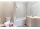 This bathroom features tile, a shower-tub, a vanity, and a toilet at 2301 Maverick St, Las Vegas, NV 89108