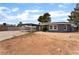 Home exterior and large backyard. Features include large carport at 2301 Maverick St, Las Vegas, NV 89108