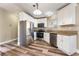 Modern kitchen with stainless steel appliances and sleek white cabinetry at 2301 Maverick St, Las Vegas, NV 89108