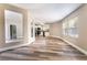 Bright living room with modern flooring flowing into an open-concept kitchen at 2301 Maverick St, Las Vegas, NV 89108